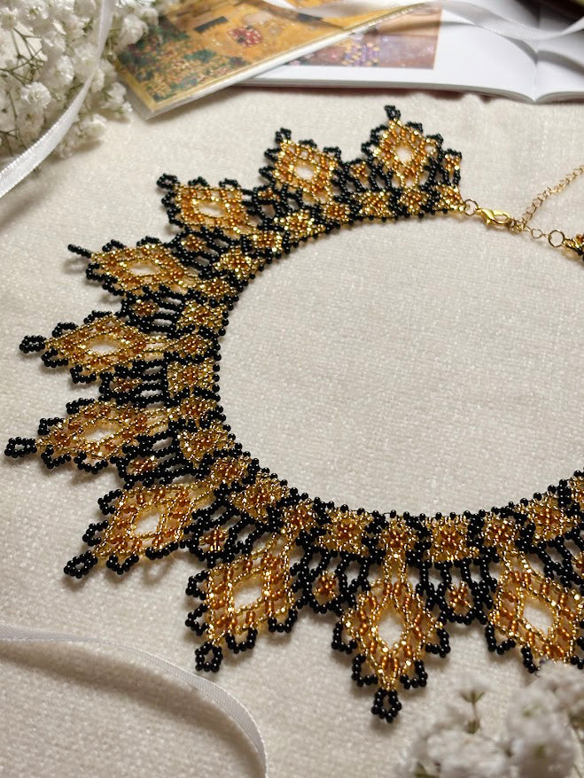 Gold and Black Beaded Collar Necklace with Lace Pattern