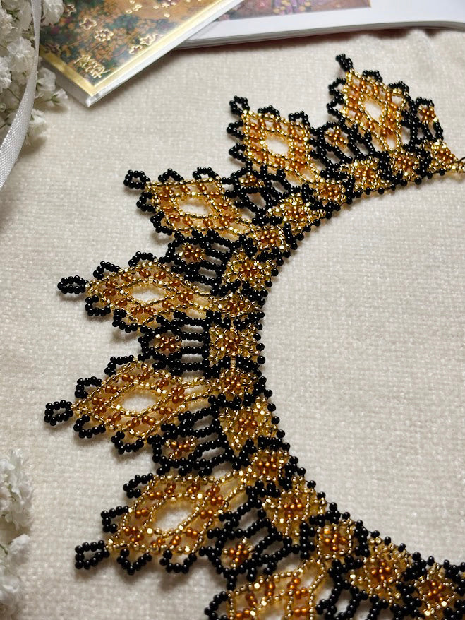 Gold and Black Beaded Collar Necklace with Lace Pattern