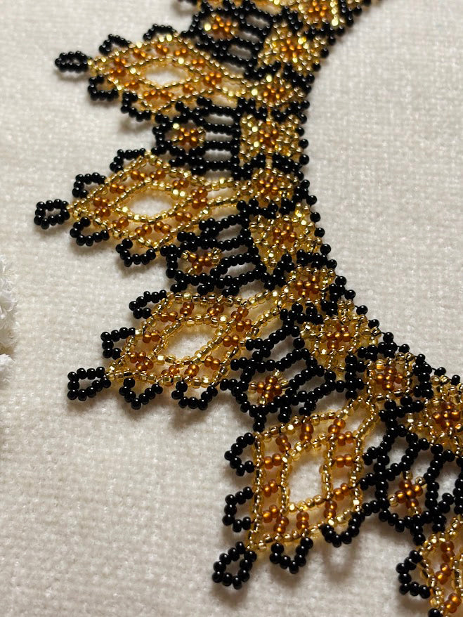 Gold and Black Beaded Collar Necklace with Lace Pattern