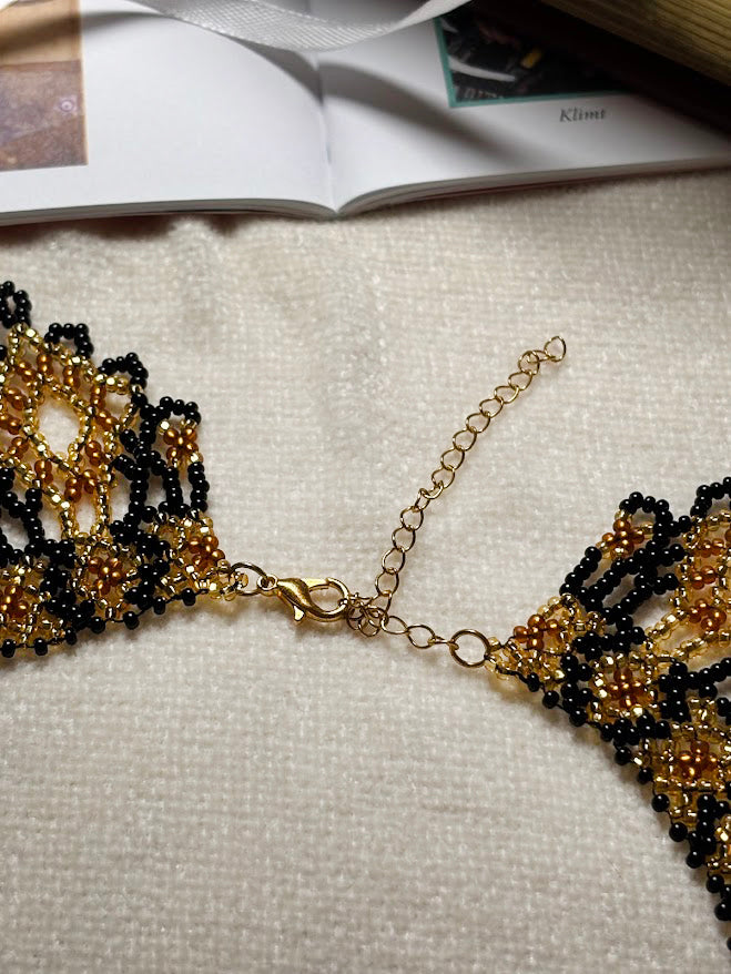 Gold and Black Beaded Collar Necklace with Lace Pattern