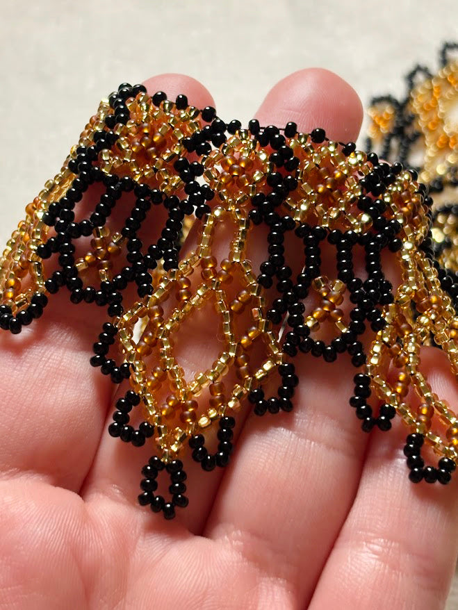Gold and Black Beaded Collar Necklace with Lace Pattern