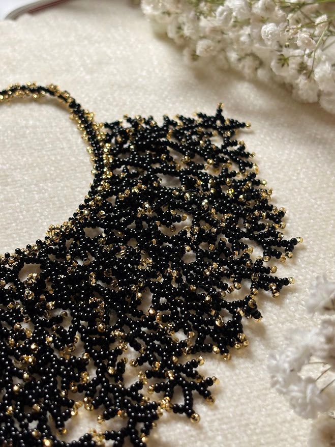 Black and Gold Beaded Collar Necklace with Coral Branch Design
