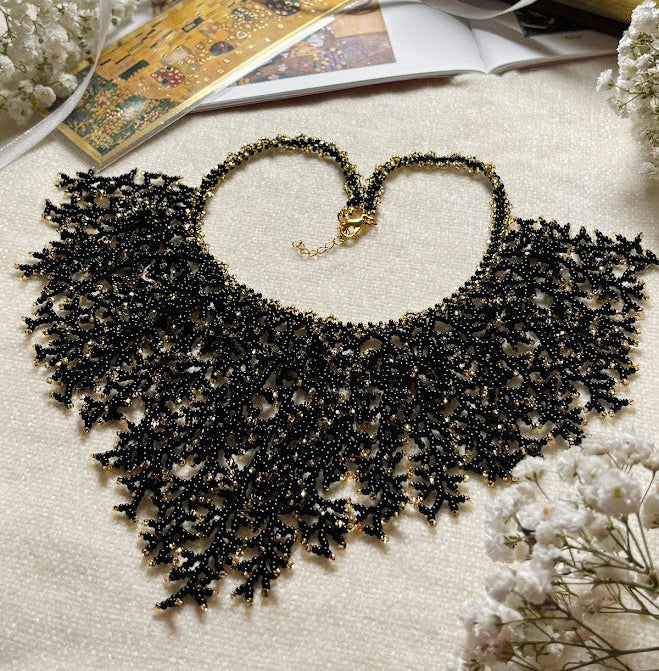 Black and Gold Beaded Collar Necklace with Coral Branch Design