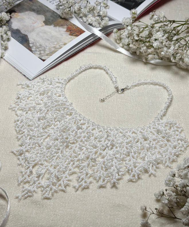 White Beaded Collar Necklace with Coral Branch Design