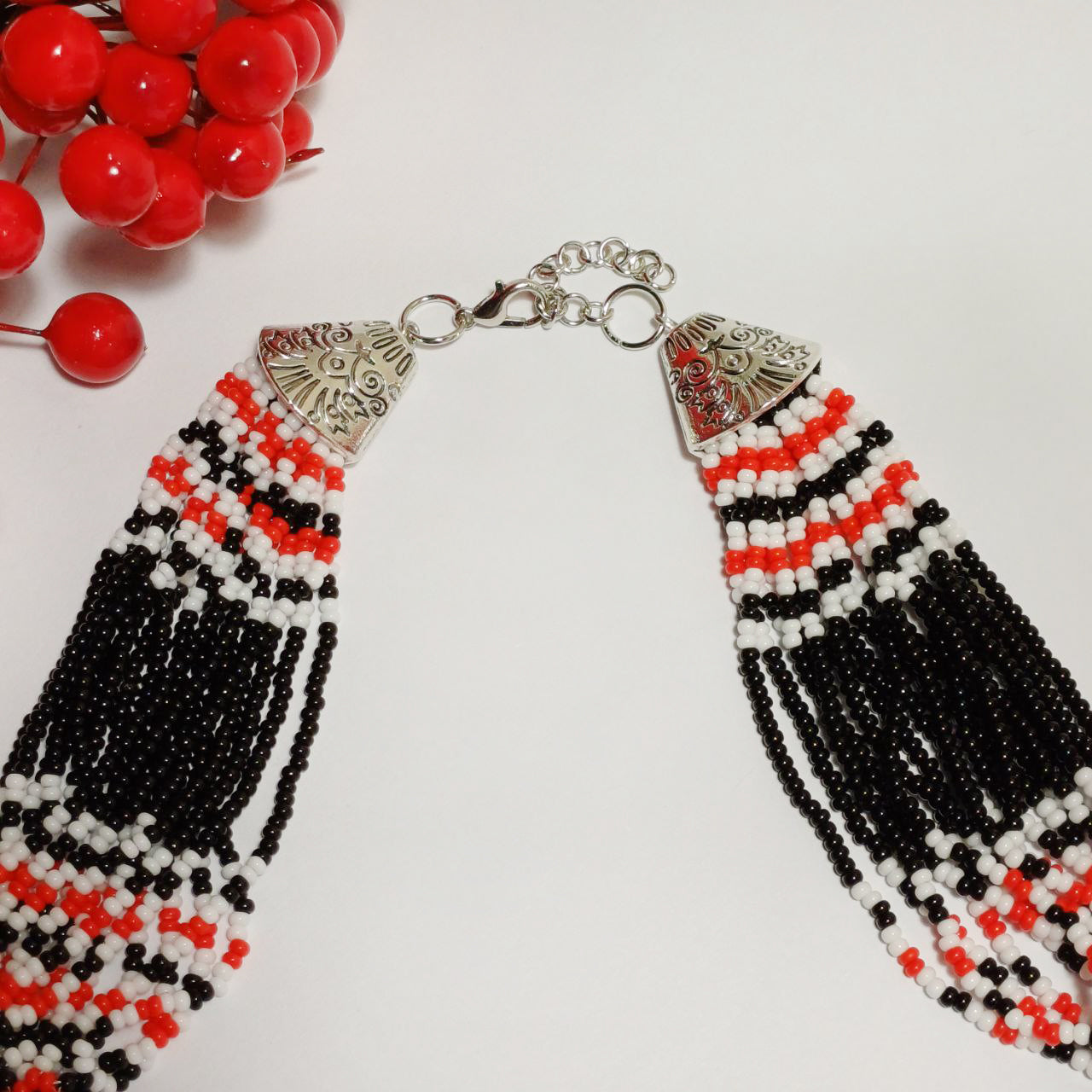 Red and Black Beaded Necklace with Traditional Pattern