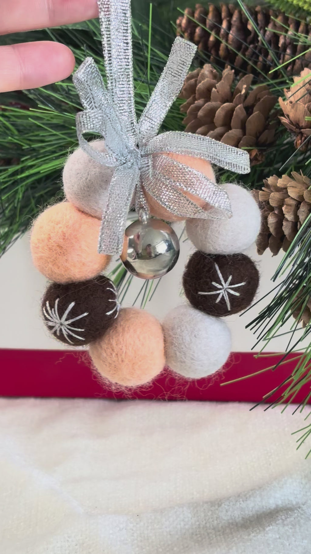 Handmade Wool Christmas Ornament with Neutral Tones and Silver Ribbon